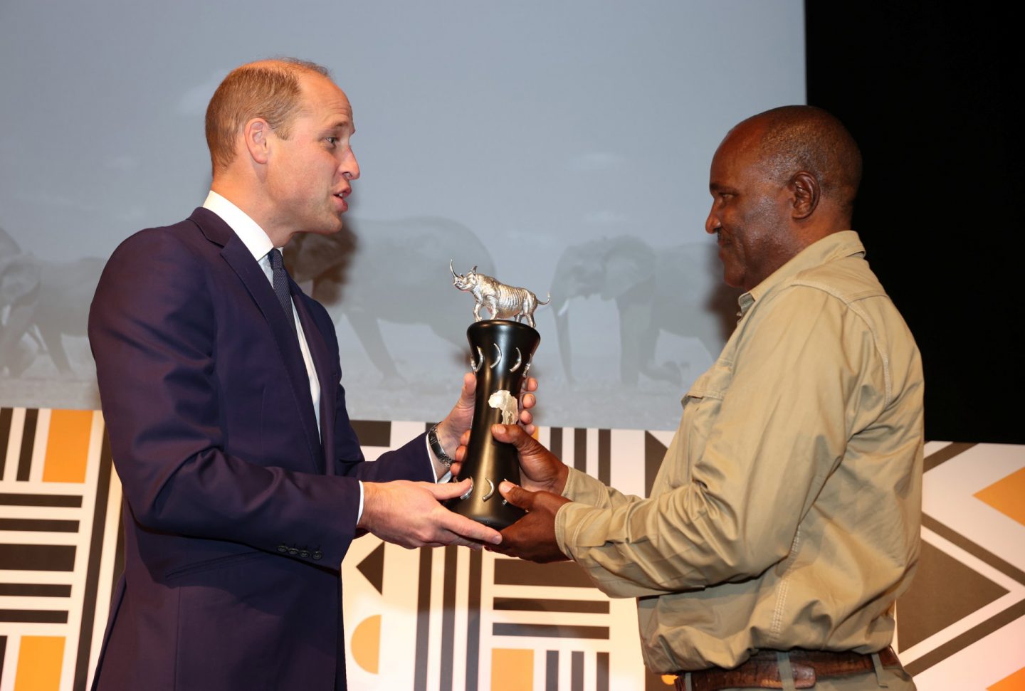  (L-R) Prince William, Duke of Cambridge presents Simson Uri-Khob with his award during the Tusk Conservation Awards 2021 at BFI Southbank on November 22, 2021 in London, England.
