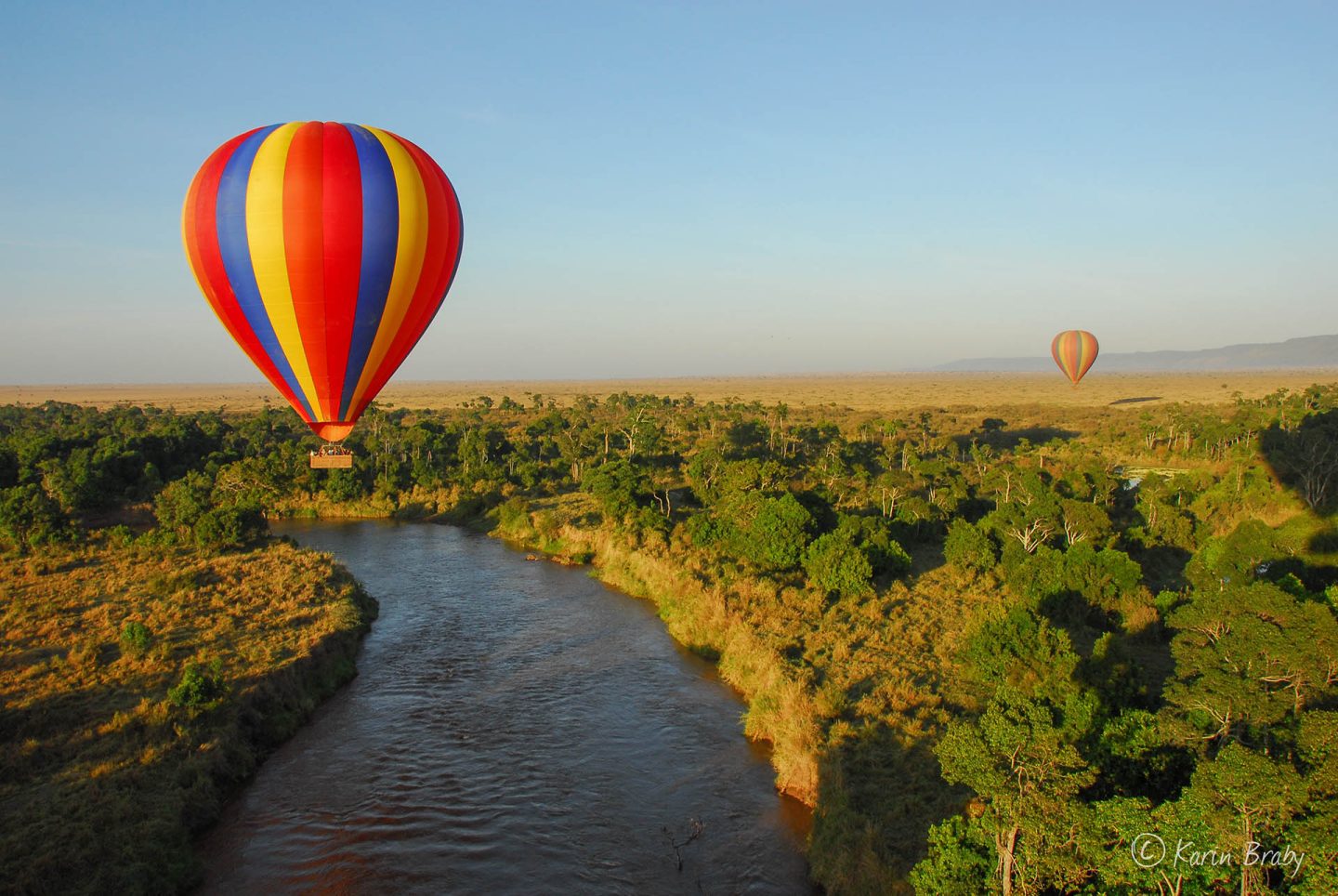 Highs: The early bird catches the worm! The early wakeup call is well worth it, floating above the Mara River and Masai Mara Reserve in a hot air balloon. Credit: Angama Mara