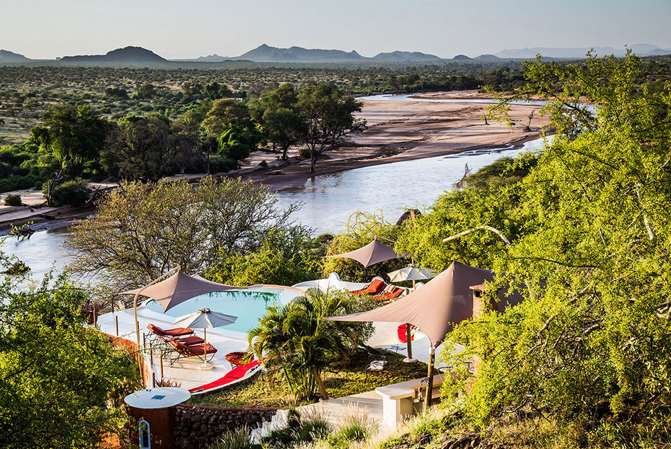 Accommodation: It's all about keeping cool! Open tents, pools, shaded areas and views...or we can arrange a beautiful night fly camping under the star filled sky. Credit: Sasaab