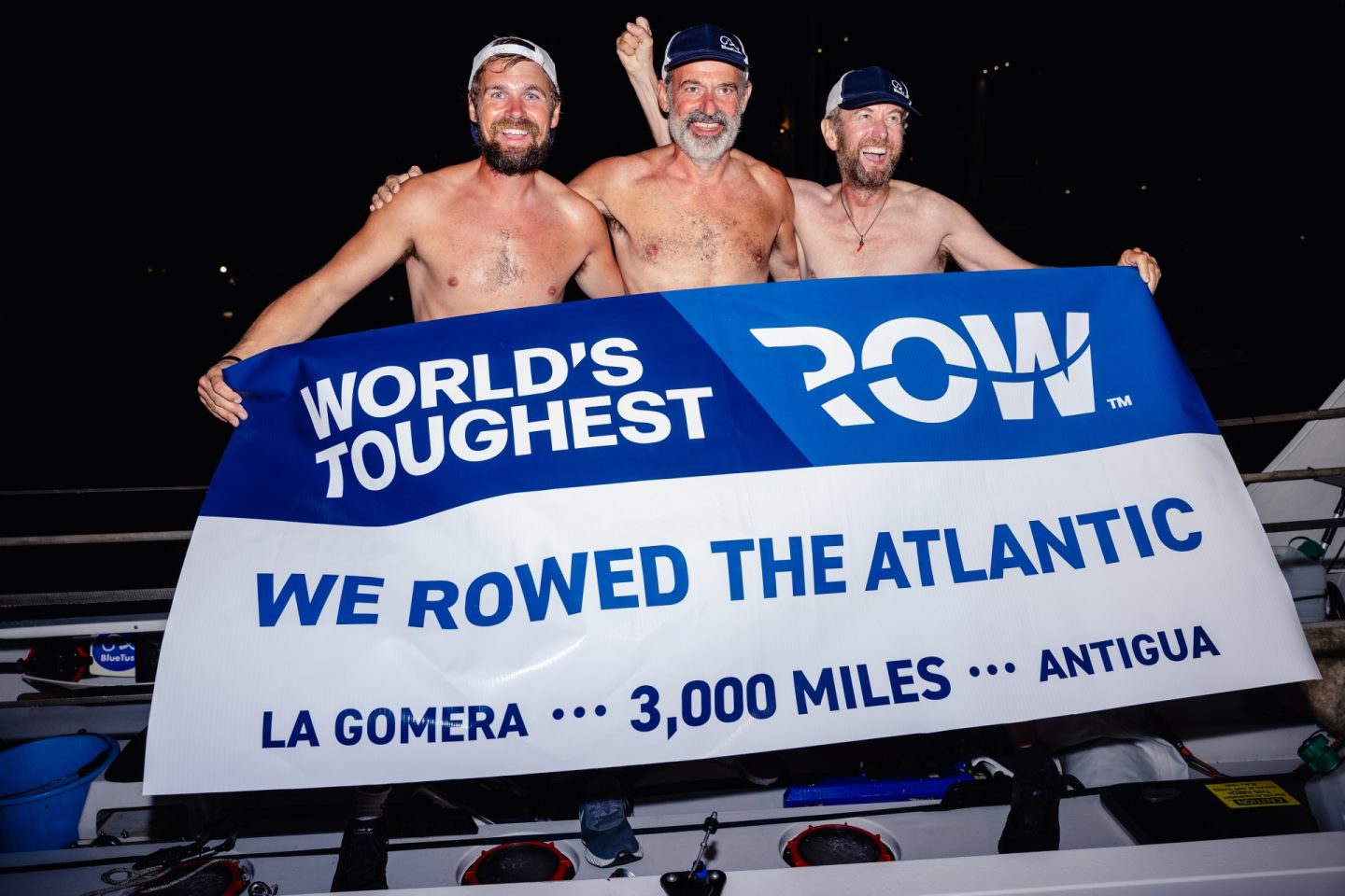 The trio, Chris Wood, Aaron Kneebone and David Tiplady completed the 3,000-mile rowing race in 38 days, 18 hours and 29 minutes, the first trio to arrive and finishing sixth overall. Credit: World’s Toughest Row